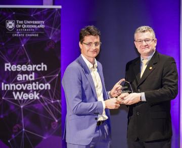 Dr Kieran O'Brien receiving Award for Excellence at UQ Research and Innovation Week